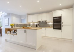 White kitchen with high gloss flooring